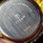 vintage titan moonphase triple calendar watch gold dial