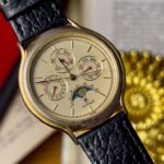 vintage titan moonphase triple calendar watch gold dial